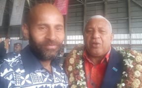 Timoci Nacola and Prime Minister Frank Bainimarama in this photo dated 24 November 2019 on Mr Nacola's Facebook account.