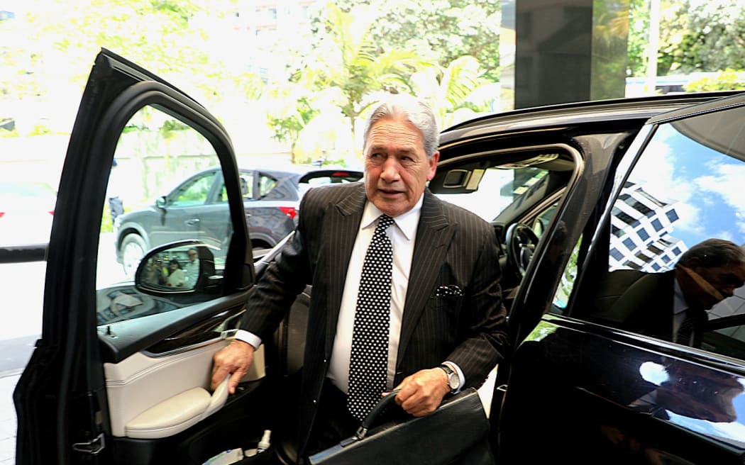 Winston Peters arrives at Cordis Hotel in Auckland for talks with the National Party.