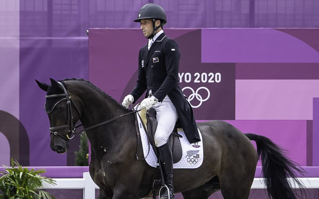 Tim Price rides Vitali during the Eventing Dressage at the Tokyo Olympics.