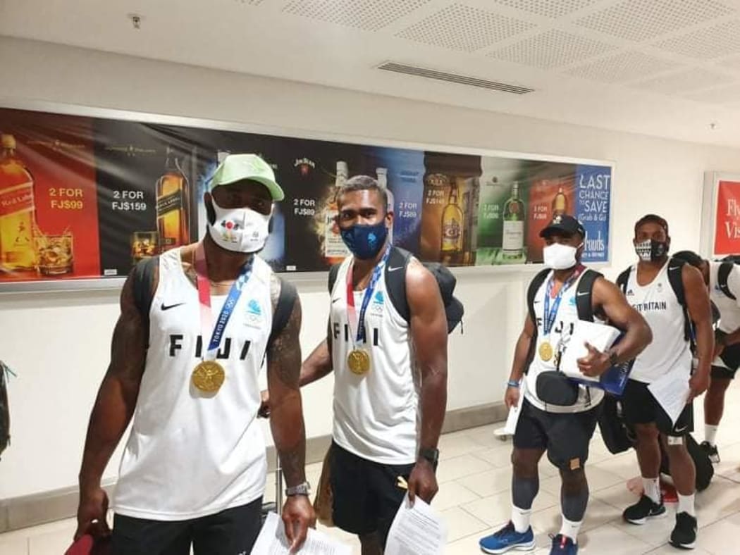 Fiji's champion sevens team arrive home.