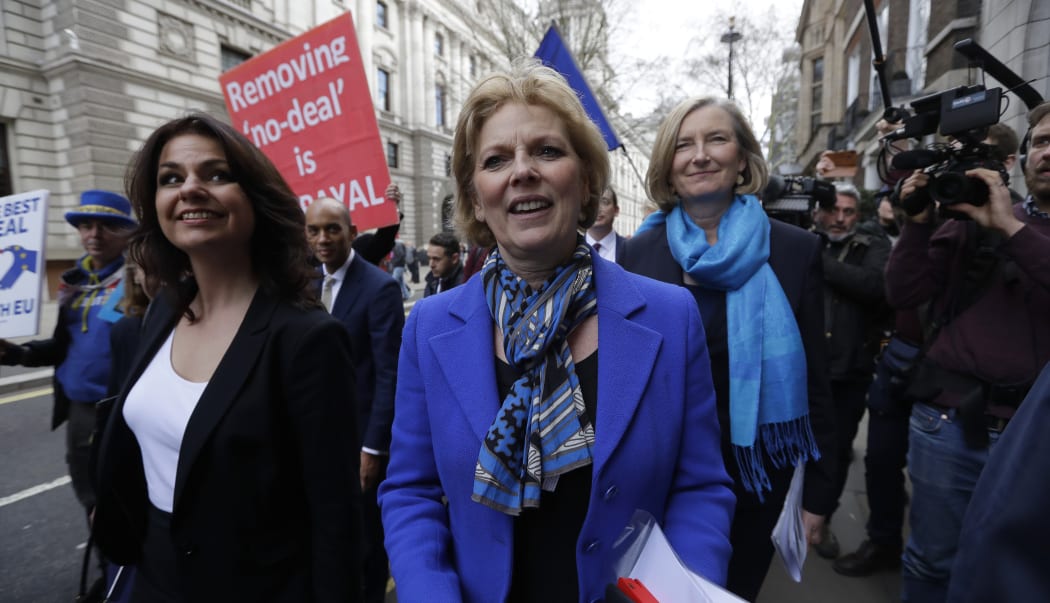 British MPs, from left, Heidi Allen, Anna Soubry and Sarah Wollaston arrive for a press conference at Westminster to announce their resignation from the Conservative Party.