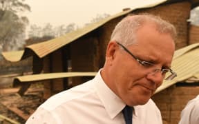 Australia's Prime Minister Scott Morrison visits a wildflower farm in an area devastated by bushfires in Sarsfield, Victoria state on January 3, 2020.