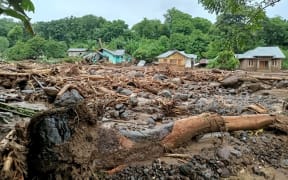 This general view shows debris left behind in the town of Adonara in East Flores on April 4, 2021, after flash floods and landslides swept eastern Indonesia and neighbouring East Timor.