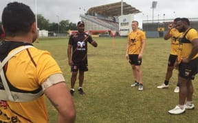 Michael Marum issues instructions to his PNG side during training