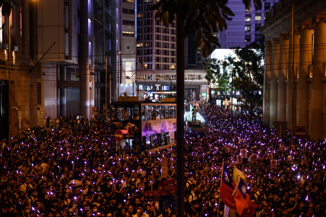 People take part in a #MeToo rally in Hong Kong on August 28, 2019, to protest alleged sexual assaults by police against anti-government female protesters. (Photo by Philip FONG / AFP)
