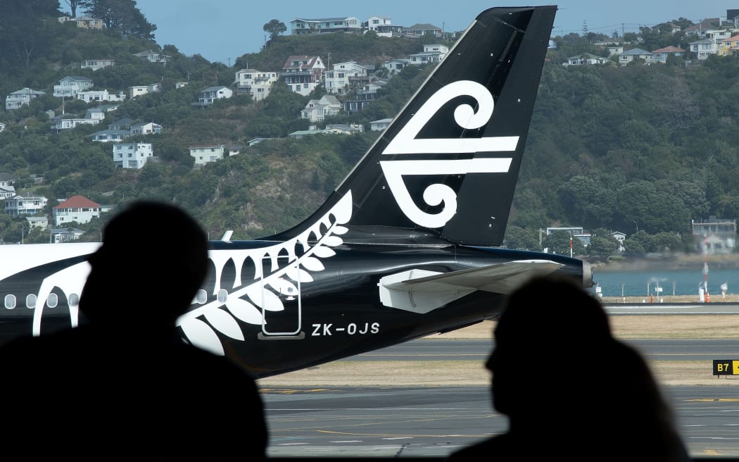 An Air New Zealand airplane waits for passengers at Wellington International airport on February 20, 2020.
