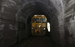 Train stuck between in a tunnel between slips.