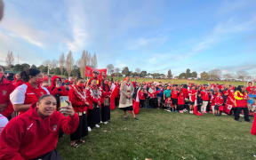 A vocal crowd of rugby league fans give the Kiwis and Mate Ma'a Tonga teams a warm welcome
