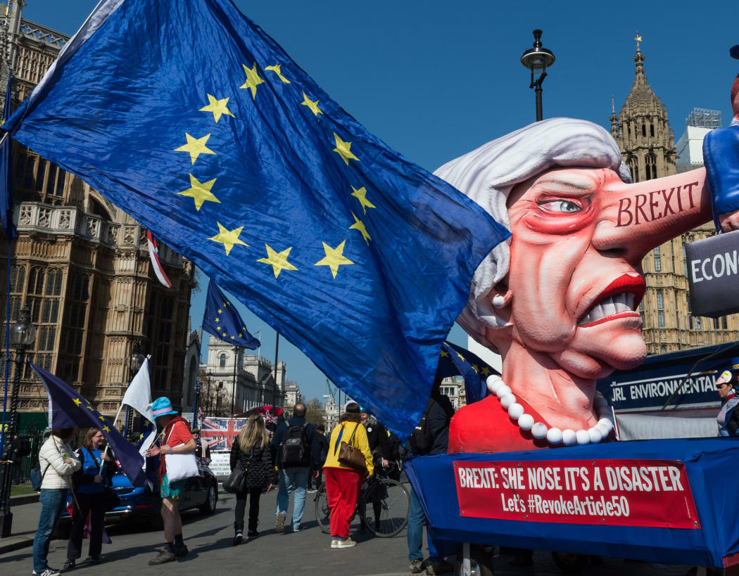 A float with a caricature of British Prime Minister Theresa as Pinocchio stands outside the Houses of Parliament during pro-EU protest on 01 April, 2019 in London, England.