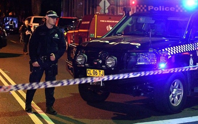 A police officer at a checkpoint in the Sydney inner suburb of Surry Hills.