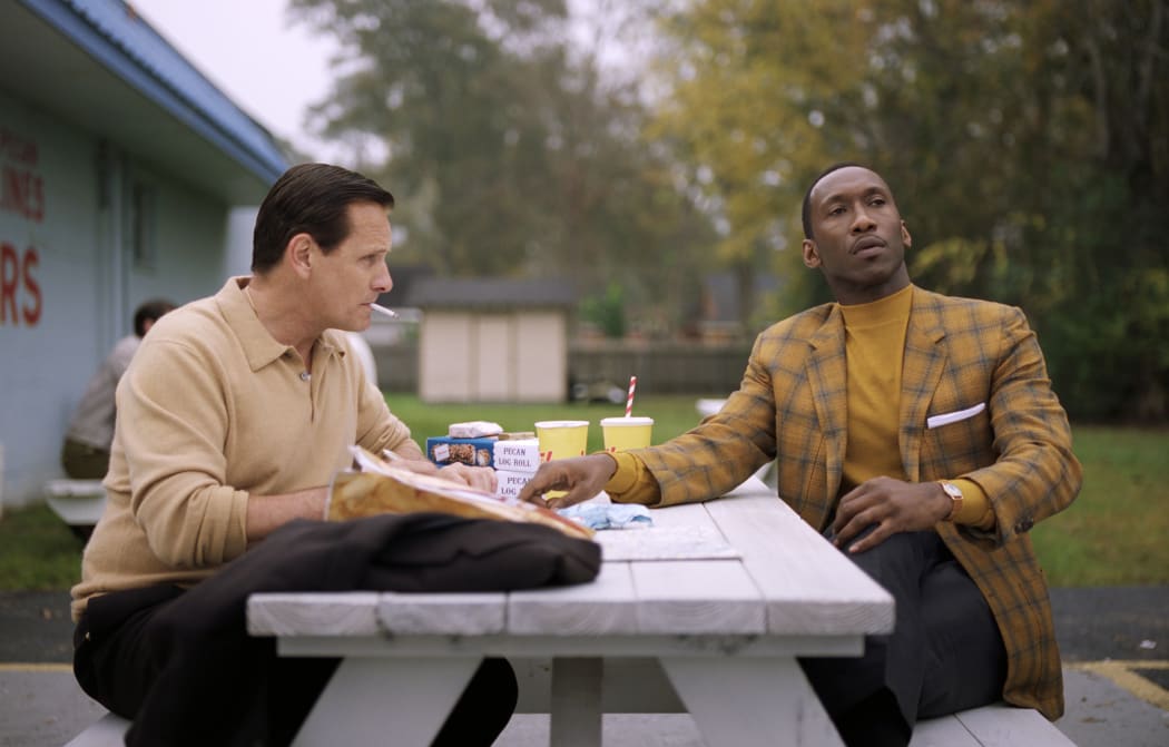 This image released by Universal Pictures shows Viggo Mortensen, left, and Mahershala Ali in a scene from "Green Book."