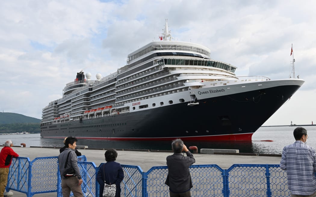 MS Queen Elizabeth  operated by the Cunard Line arrives at Otaru Port in Otaru City, Hokkaido Prefecture on May 27, 2023. The cruise ship which is traveling Japan for the first time in four years called at the port for the first time. ( The Yomiuri Shimbun ) (Photo by Taketo Oishi / Yomiuri / The Yomiuri Shimbun via AFP)