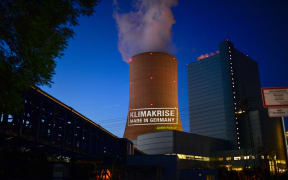 Greenpeace activists project the slogan "Climate crisis  made in Germany" on the coal-fired power plant Datteln 4 of Uniper in Datteln, Germany, on May 30, 2020.