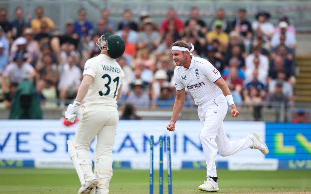 Stuart Broad of England celebrates dismissing David Warner of Australia during the first Ashes test 2023.