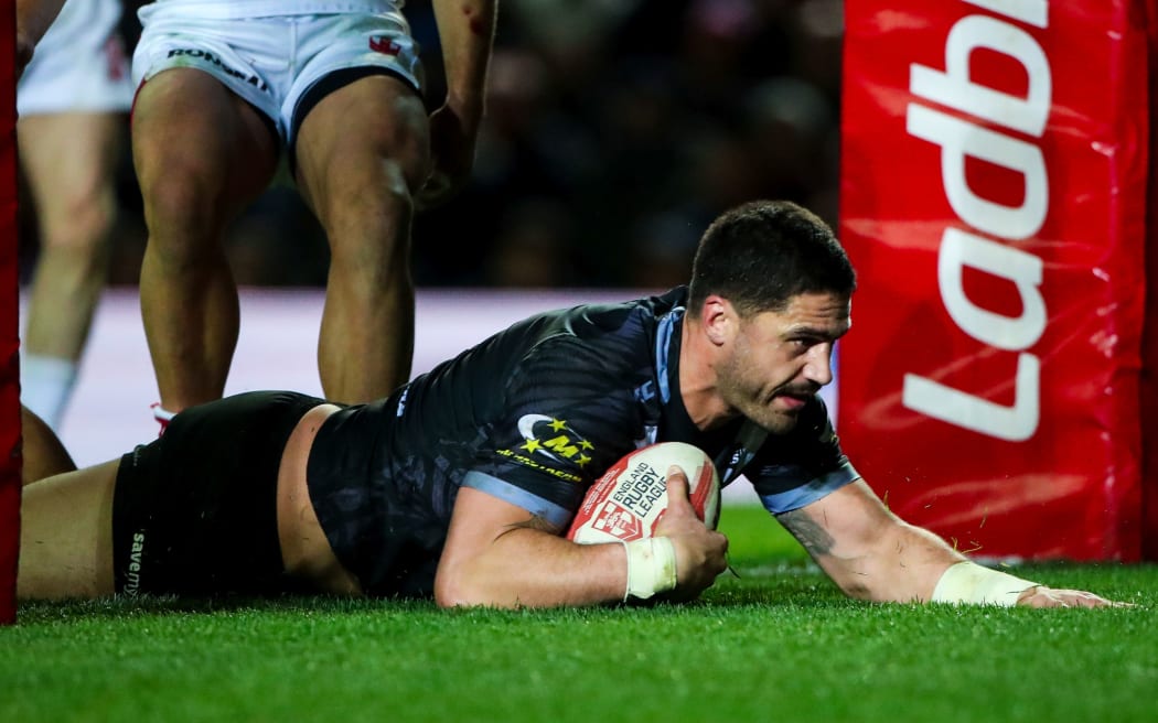 Jesse Bromwich scores a try for the Kiwis.