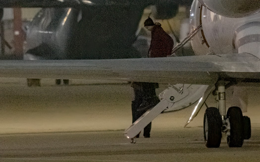American basketball star Brittney Griner gets out of a plane after landing at the JBSA-Kelly Field Annex runway on 9 December, 2022 in San Antonio, after she was released from a Russian prison in exchange for a notorious arms dealer.