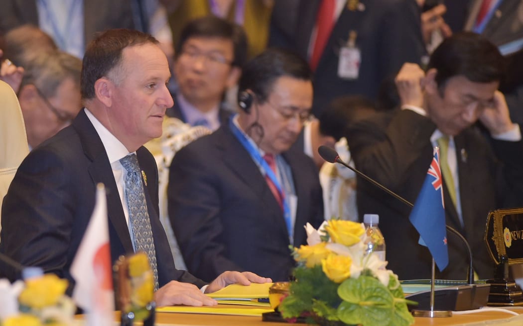 Prime Minister John Key, left, at the East Asian Summit Plenary Session in Myanmar's capital Naypyidaw.