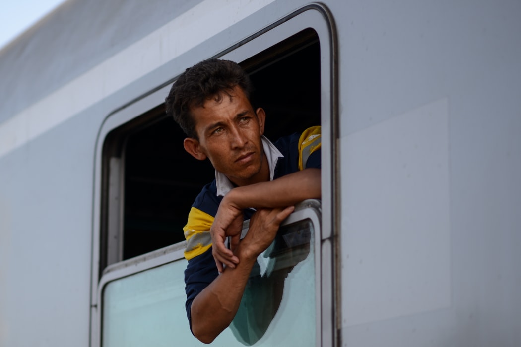 Croatia is transporting refugees to Hungary after reversing its one-door policy.