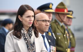 Prime Minister Jacinda Ardern and Defence Minister Ron Mark at the ramp ceremony at Auckland International Airport.