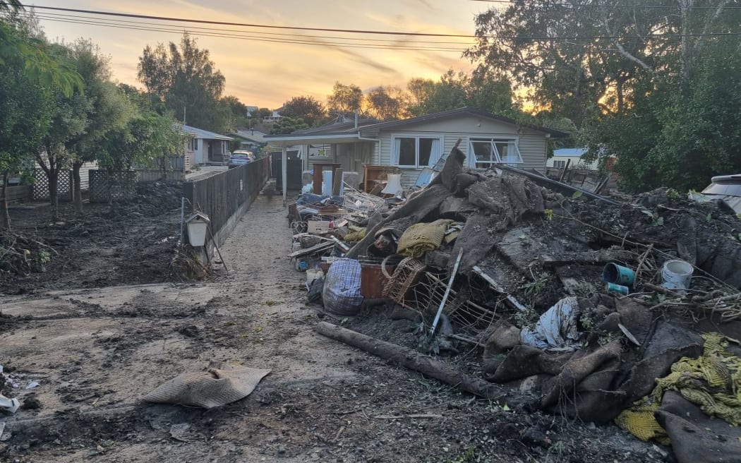 Pictures of Joll Road, Havelock North. The town was largely spared from the cyclone but a small pocket wasn't so lucky. This street backs on to the Mangarau Stream, and was ravaged. A stark contrast to the manicured lawns and neatly trimmed hedges on neighbouring streets.