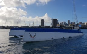 An overturned catamaran at Westhaven Marina on Tuesday after an overnight storm hit downtown Auckland.