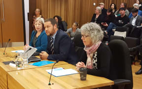 Otautahi Community Housing Trust chief executive Cate Kearney, chair Alex Skinner, and deputy chair Pam Sharpe address the council ahead of the vote.