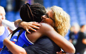 Mystics head coach Helene Wilson  and Grace Nweke after their win over the Magic.