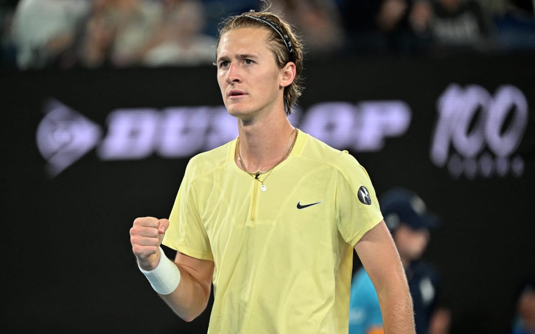 Sebastian Korda of the US reacts after a point against Russia's Daniil Medvedev during their men's singles match on day five of the Australian Open tennis tournament in Melbourne on January 20, 2023. (Photo by Paul CROCK / AFP) / -- IMAGE RESTRICTED TO EDITORIAL USE - STRICTLY NO COMMERCIAL USE --