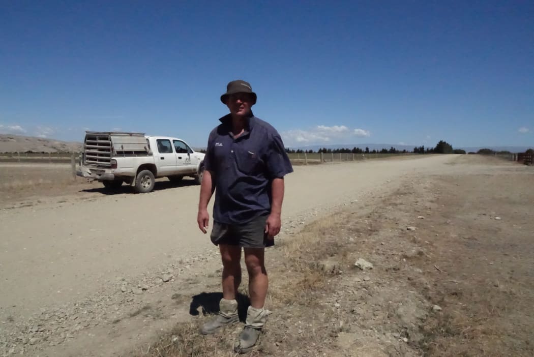 Farmer Andrew Paterson on his bone dry  farm near Omakau, Central Otago.