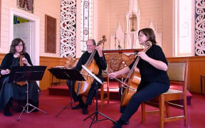 Robert Oliver (centre) and his group the Palliser Viols