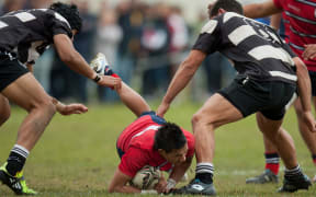 Kelston's Rameka Uitimei-Paraki takes a dive during the NZ secondary schools boys rugby final for the Barbarian Cup between Kelston Boys High School and Wesley College, won 24-14 by Kelston at Rotorua Boys High School, Rotorua, New Zealand, Sunday 28 August 2011.