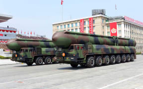 A picture released by North Korea last month which shows ballistic missiles on display during a military parade.