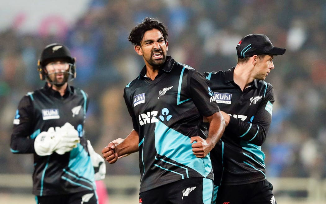 Ish Sodhi celebrates a wicket against India in 2023.
