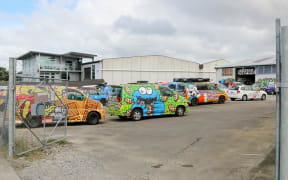 Wicked campervans parkedup at the company's yard.