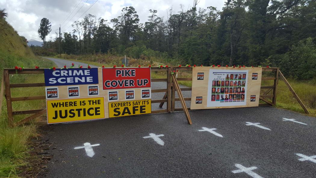 A makeshift checkpoint set up on the road to Pike River Mine by some of the families of the 29 men who died.