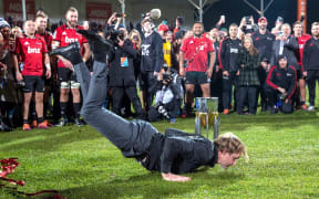 Crusaders coach Scott Robertson displays his trademark breakdancing routine after the Crusaders' 19-3 win over the Jaguares in the Super Rugby final.