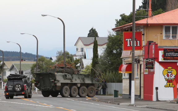A Defence Force LAV (light armoured vehicle) heads up Chaucer Road during the Napier Siege.