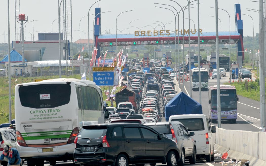 Heavy traffic congestion builds during roadworks at a major highway junction in Brebes. 12 people died in a traffic that lasted 3 days