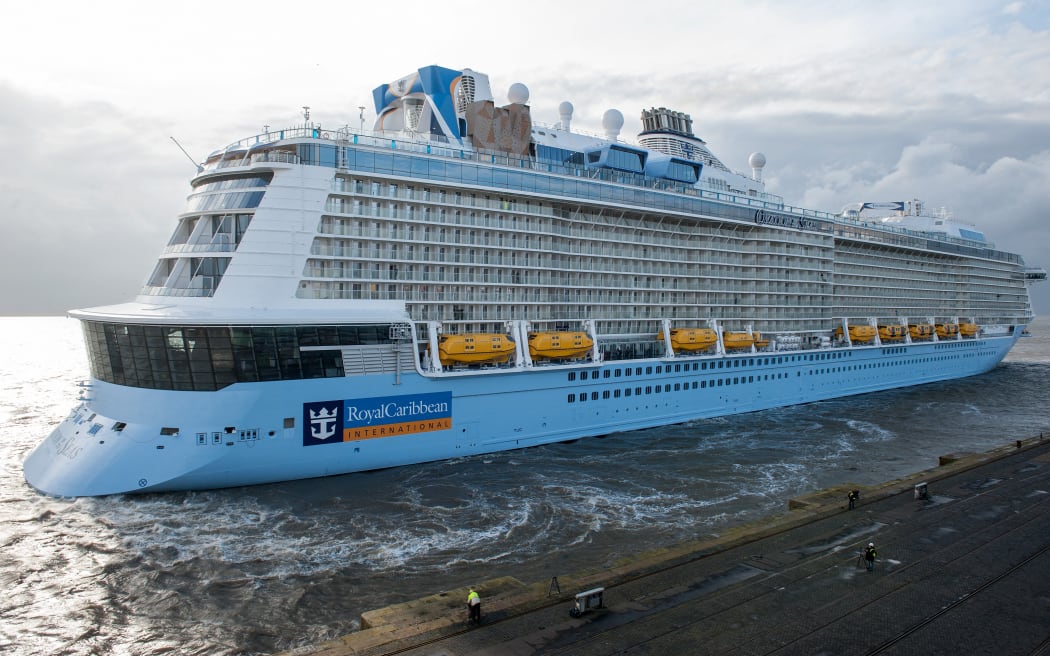 The new cruise ship of the Meyer dockyard in Papenburg, 'Ovation of the Seas', arriving in bremerhaven, Germany, 28 March 2016. After the first major test run on the North Sea, the 348 meter long ship will be finalised for the handover to the US-American shipping company 'Royal Carribean International'.
