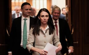 Prime Minister Jacinda Ardern, with Green party co-leader James Shaw, left) and Agriculture Minister Damien O'Connor prepare to announce the government's decision on agricultural emissions.