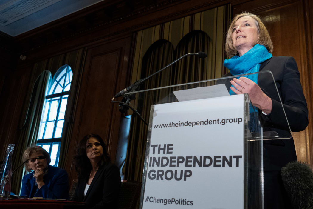 Former Conservative Party and now an Independent MP Sarah Wollaston (R) speaks at a press conference with her colleagues Anna Soubry (L) and Heidi Allen (C) in central London.