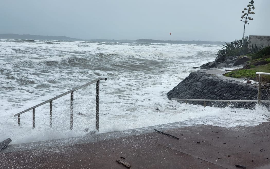 Orewa Beach on Sunday afternoon, as Cyclone Gabrielle makes its way to New Zealand.