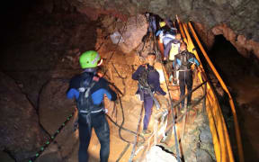 Thai Navy divers in Tham Luang cave during the early stages of the rescue operation.