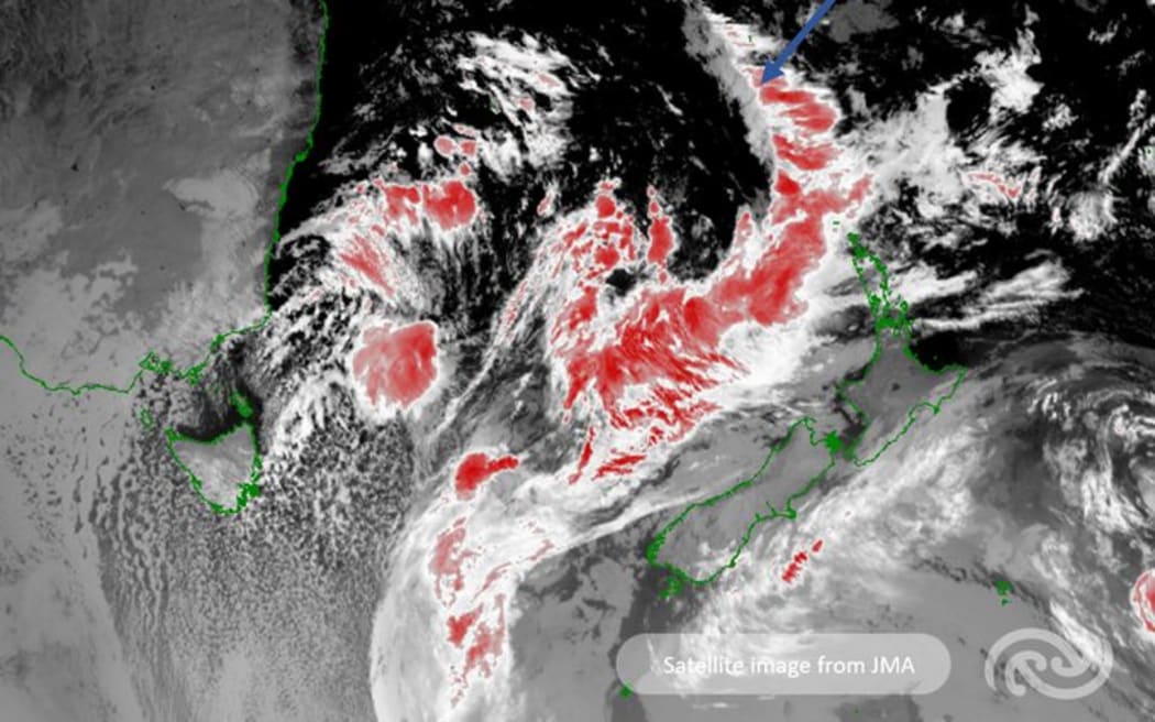 A satellite image shows an approaching front in the Tasman Sea.