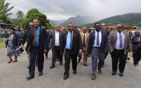 PNG Prime Minister James Marape (centre) arrives in Arawa for talks with Bougainville's President Ishmael Toroama (second from right) 5 February, 2021