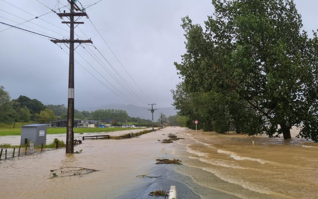 Flooded roads in Kaipara District, Northland.