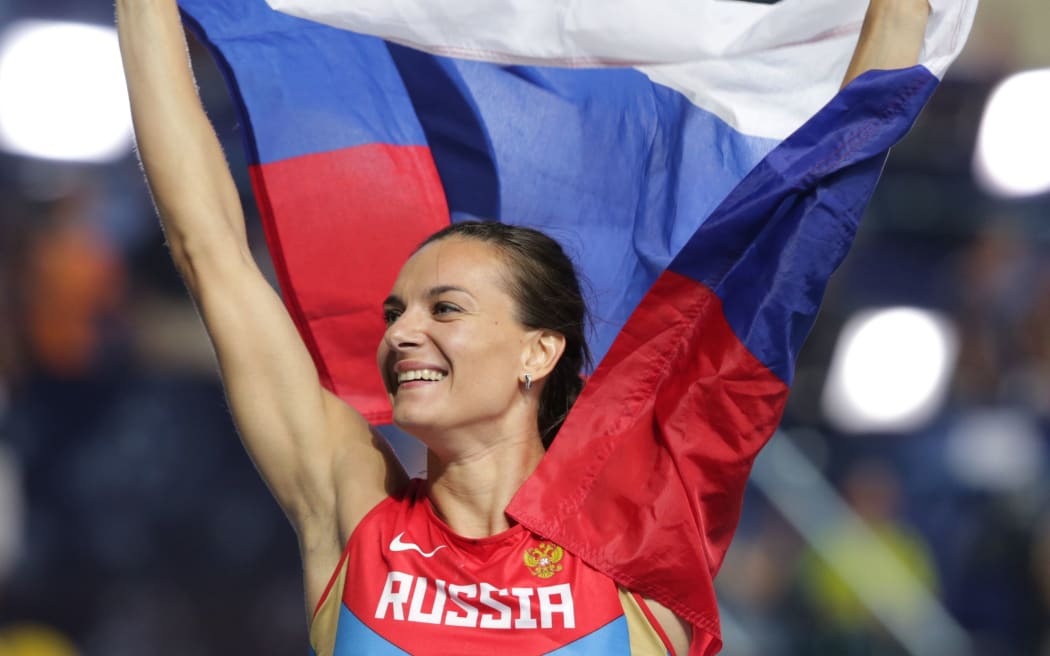 Pole vaulter Yelena Isinbayeva of Russia celebrates after winning. Note: she is not implicated in the latest doping claims.