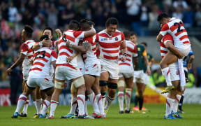Japan celebrate their shock victory over the Springboks at the World Cup in 2015.