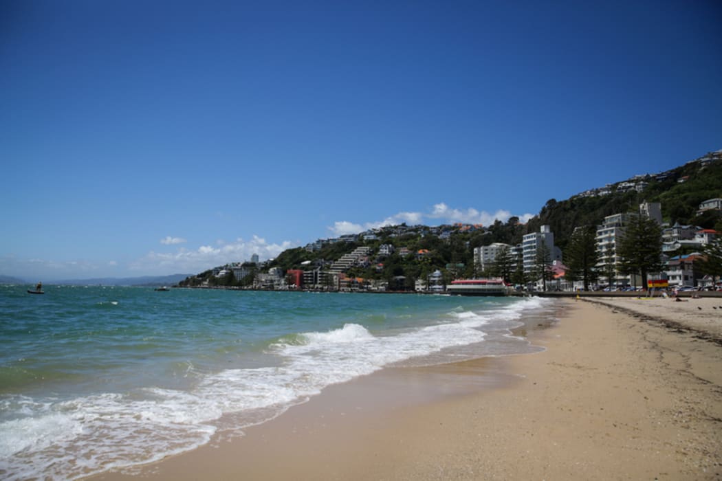 Oriental Bay after weather bomb, not many on the beach but the sky is blue and sun it out