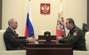 Russian President Vladimir Putin meets with chief of the National Guard Viktor Zolotov at the Novo-Ogaryovo state residence outside Moscow on May 6, 2020.